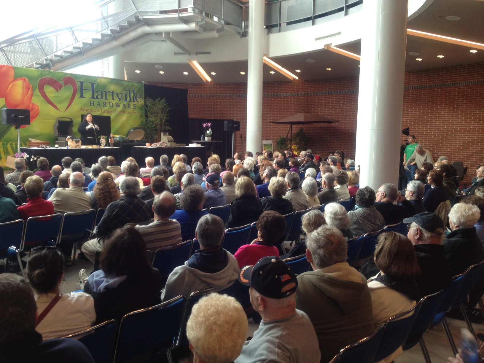 Dr. Lori appraising antiques before a crowd